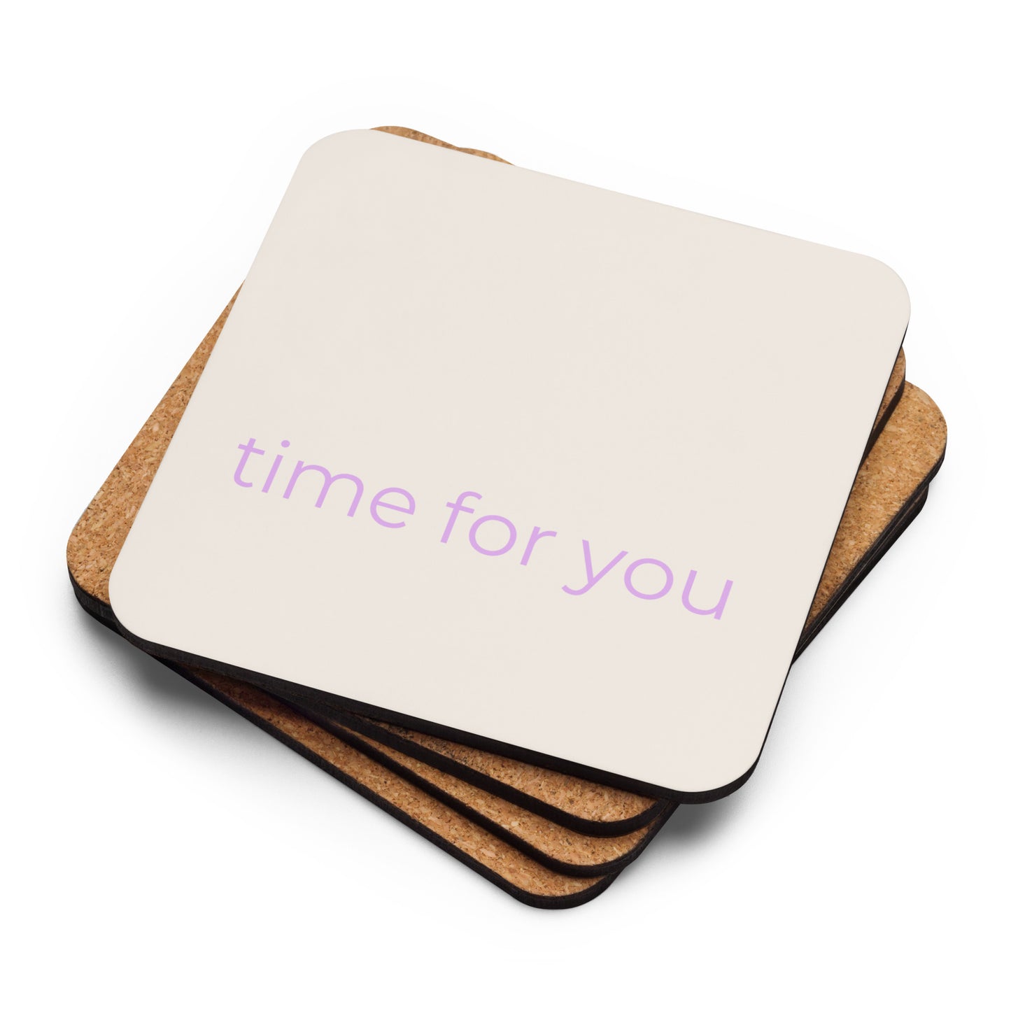 Stack of neutral cork-back coasters with “time for you” text in soft purple showing layered edges