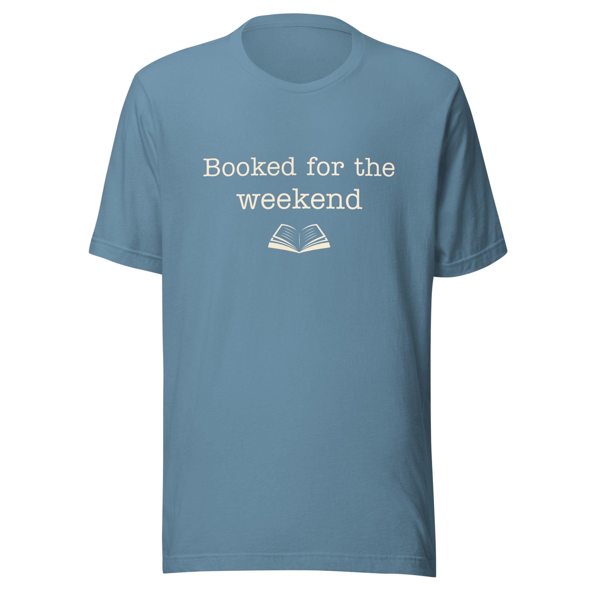 Steel Blue “Booked for the Weekend” T-shirt with warm cream text and a small open book illustration.