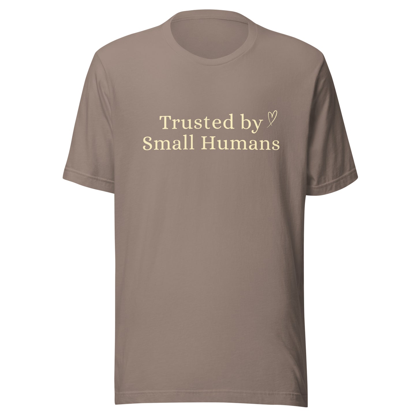 Trusted by Small Humans T-Shirt in Pebble, featuring soft cream serif lettering and a small heart detail on a Bella+Canvas unisex tee.