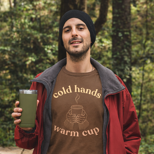 Man wearing Espresso Cold Hands Warm Cup autumn T-Shirt outdoors holding a travel mug