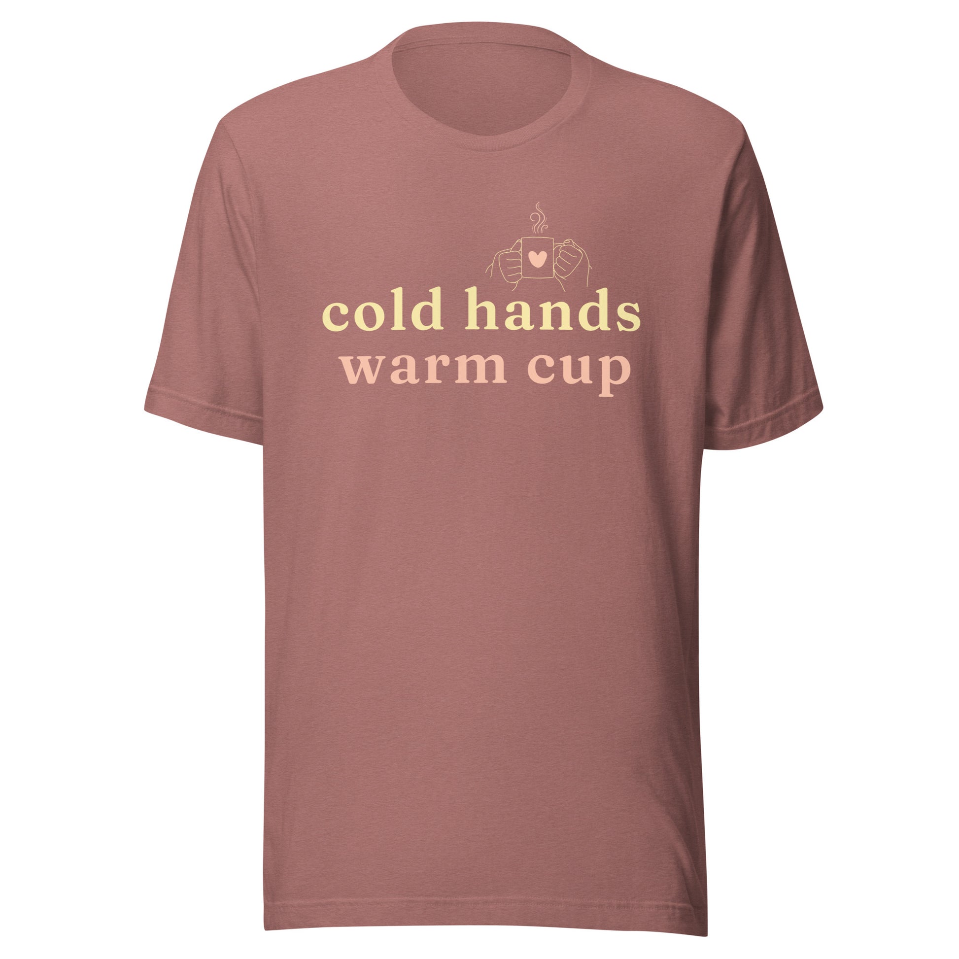 Cold Hands Warm Cup T-Shirt in Heather Mauve with warm cream text and a small cup illustration, shown as a front flat product mockup.