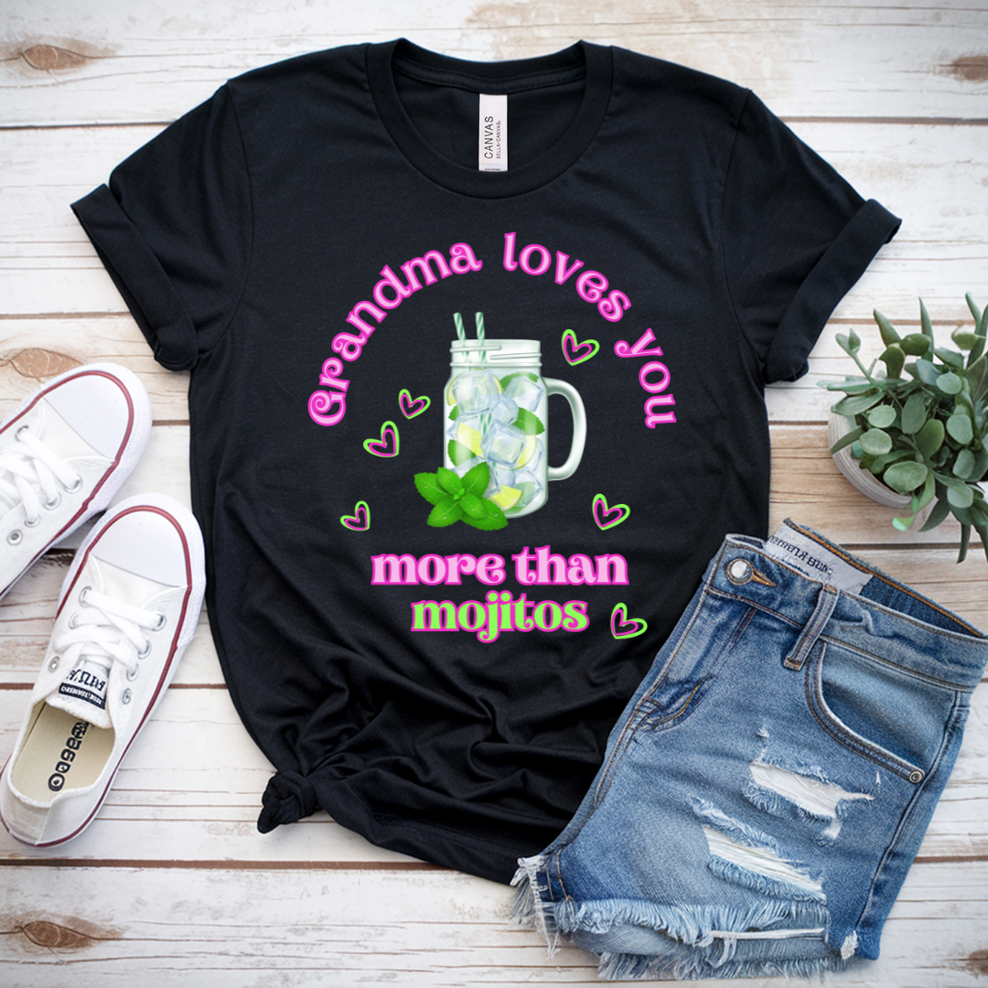 Flat lay of Grandma Loves You More Than Mojitos T-shirt styled with jeans
