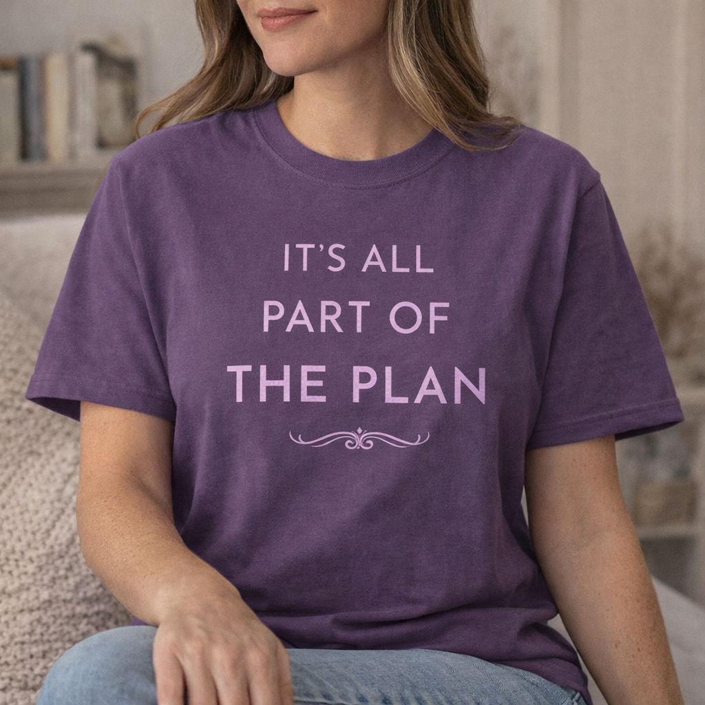 Woman wearing a grape purple Comfort Colors T-shirt with “It’s All Part of the Plan” text, relaxed fit lifestyle mockup