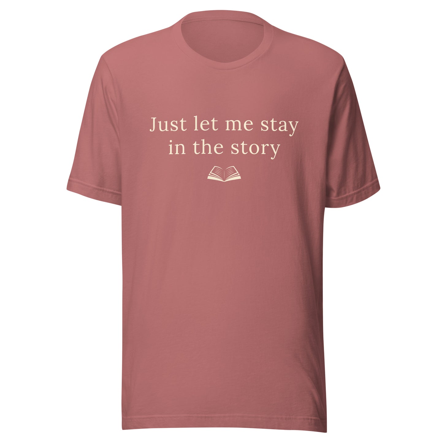 Mauve “Just Let Me Stay in the Story” T-Shirt with warm cream text and a small open book illustration.