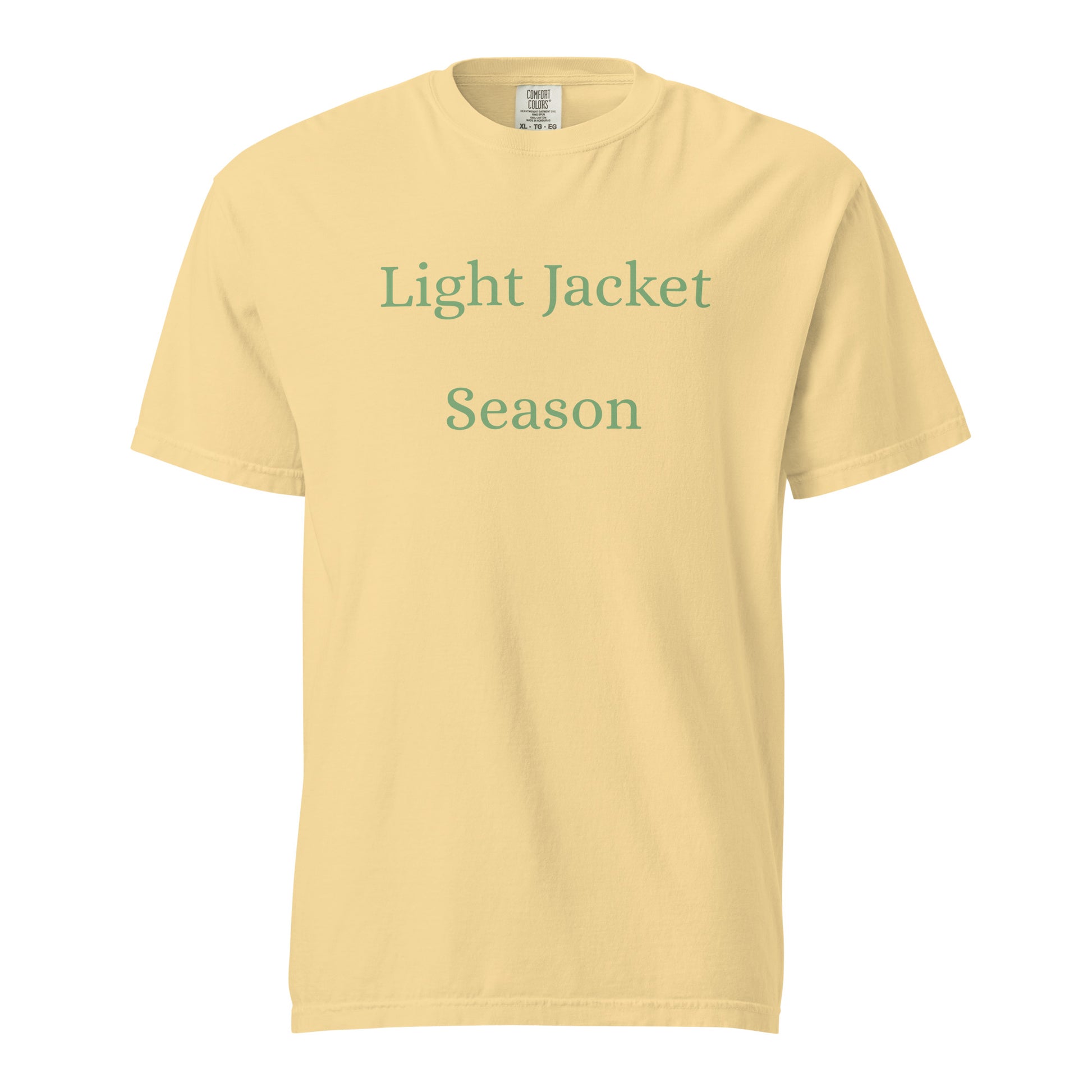 Light Jacket Season Comfort Colors T-shirt in butter yellow with soft sage green text celebrating warm spring days