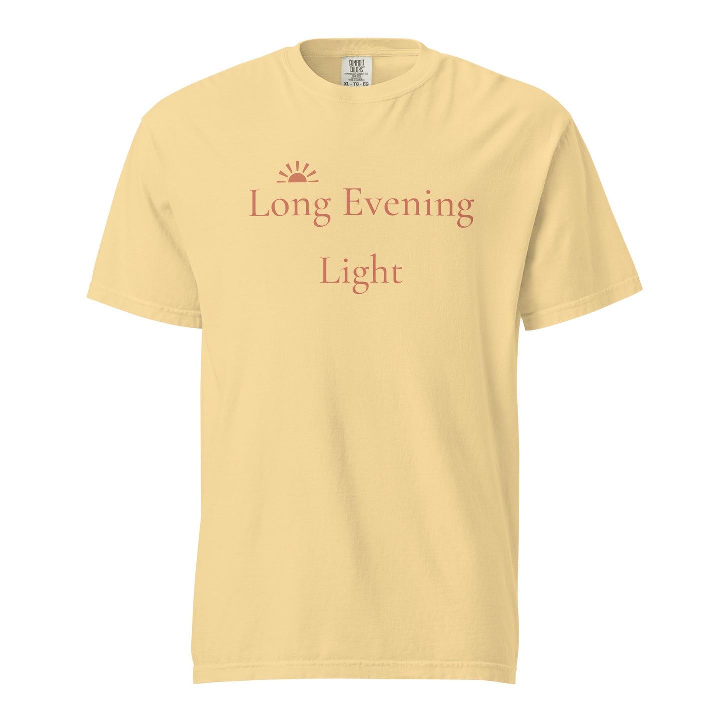 Comfort Colors butter T-shirt with Long Evening Light sunset design in terracotta lettering