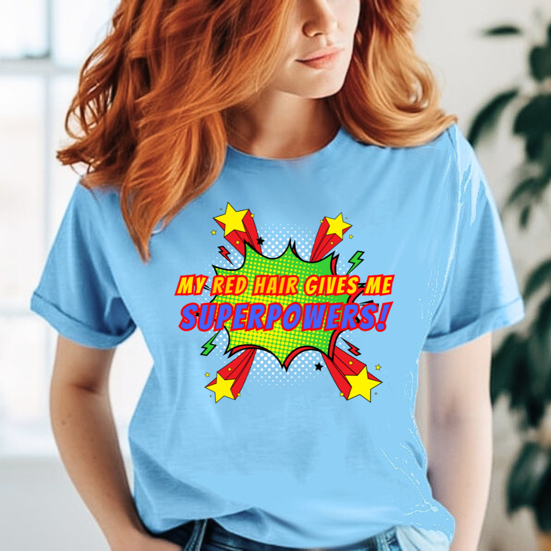Lifestyle photo of model wearing red hair superpowers graphic T-shirt in blue