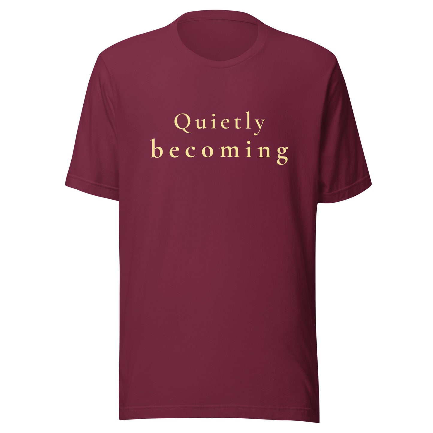 Burgundy “Quietly Becoming” T-Shirt with warm cream text in an understated positive quote design.