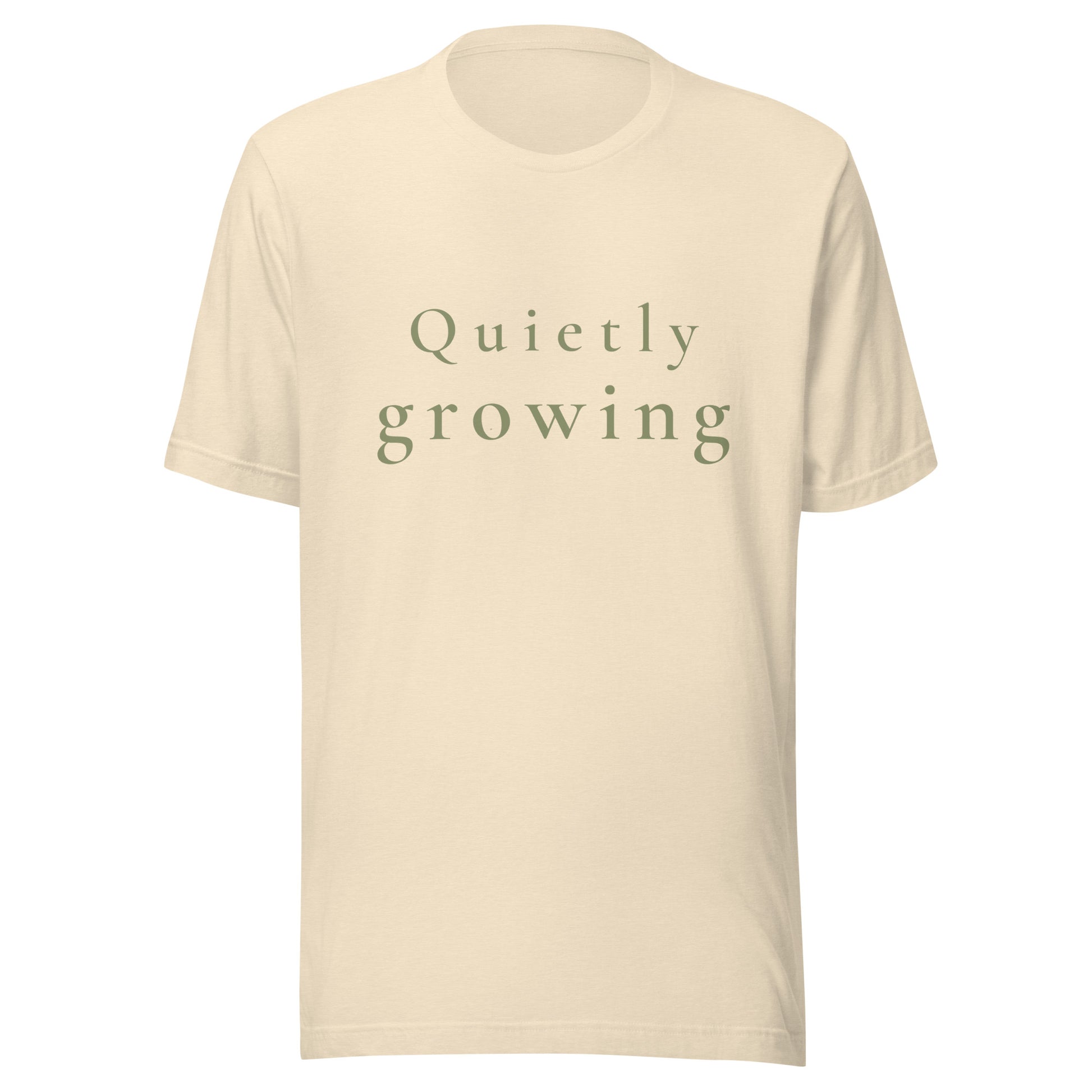 Heather Natural Quietly Growing T-shirt product mockup with soft sage text.