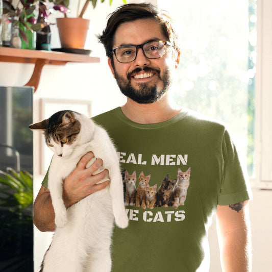 Man wearing Real Men Love Cats T-shirt holding a cat