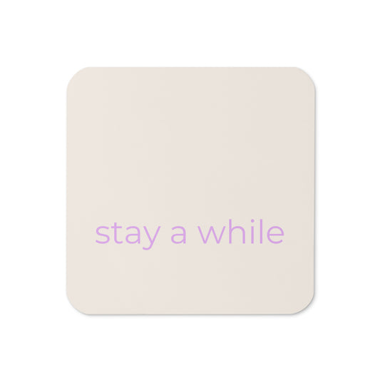Minimalist neutral coaster with “stay a while” text in soft purple on a warm neutral background