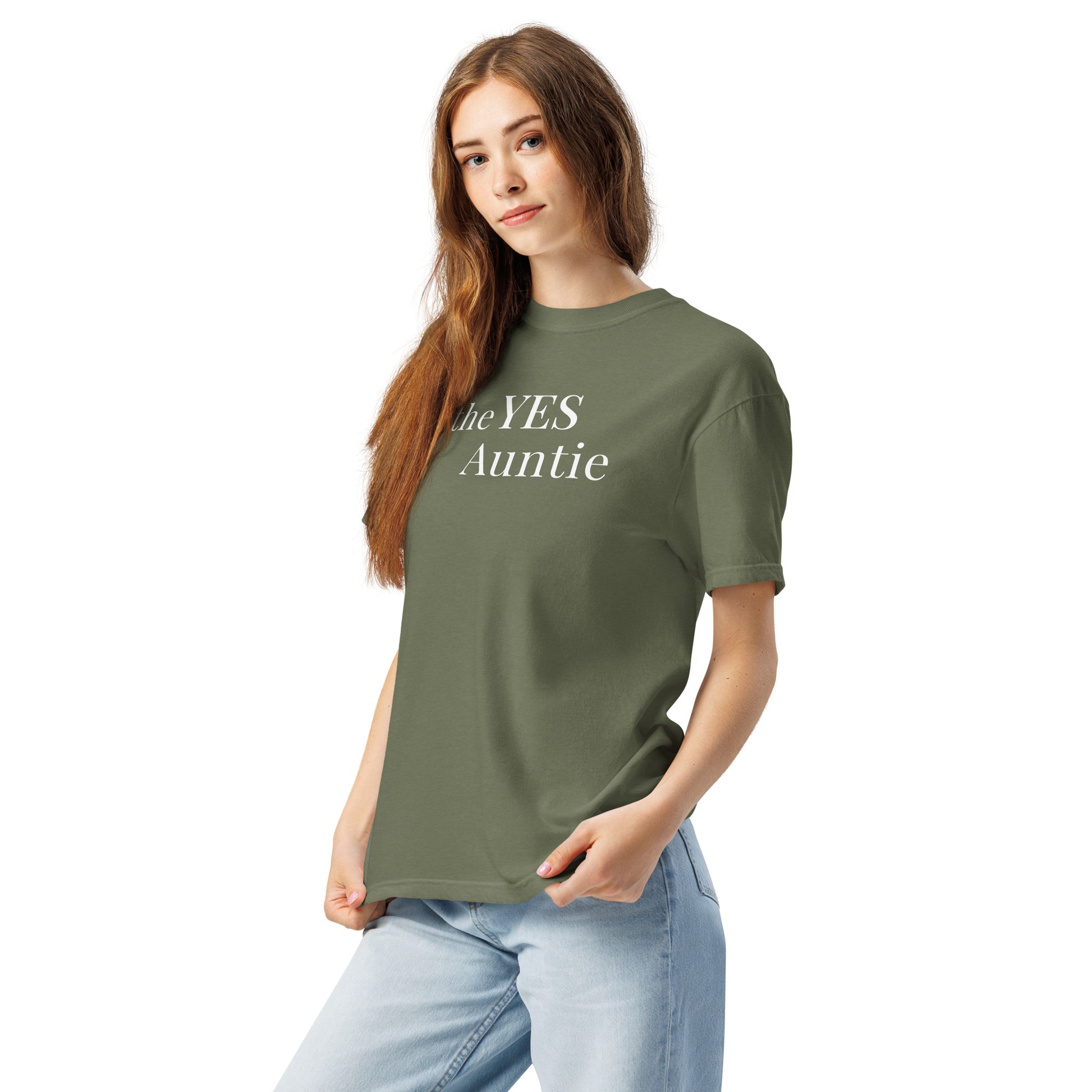 Woman wearing The Yes Auntie T-shirt in moss green with white typography design