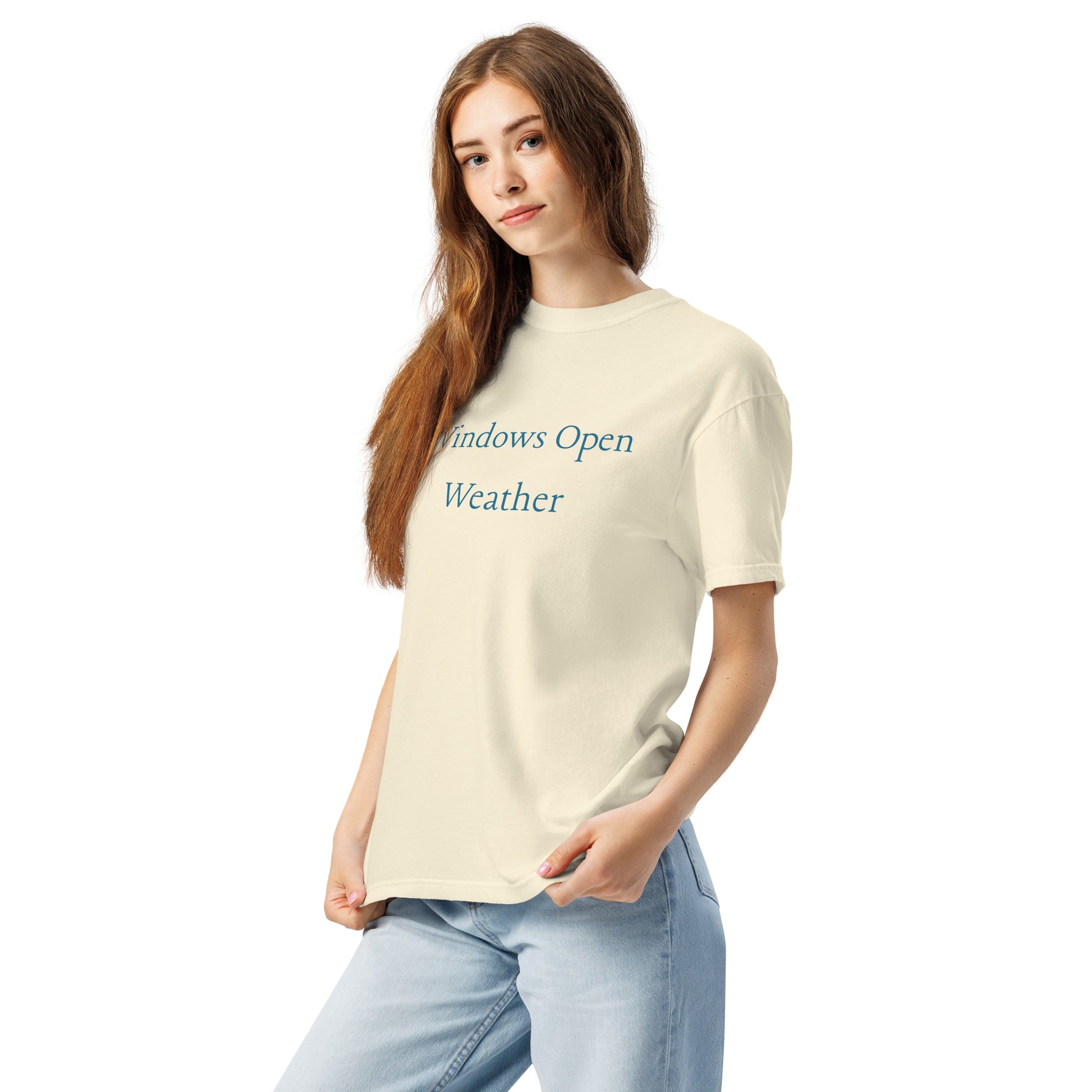 Woman wearing ivory Windows Open Weather T-shirt with blue text, casual spring outfit perfect for light jacket season