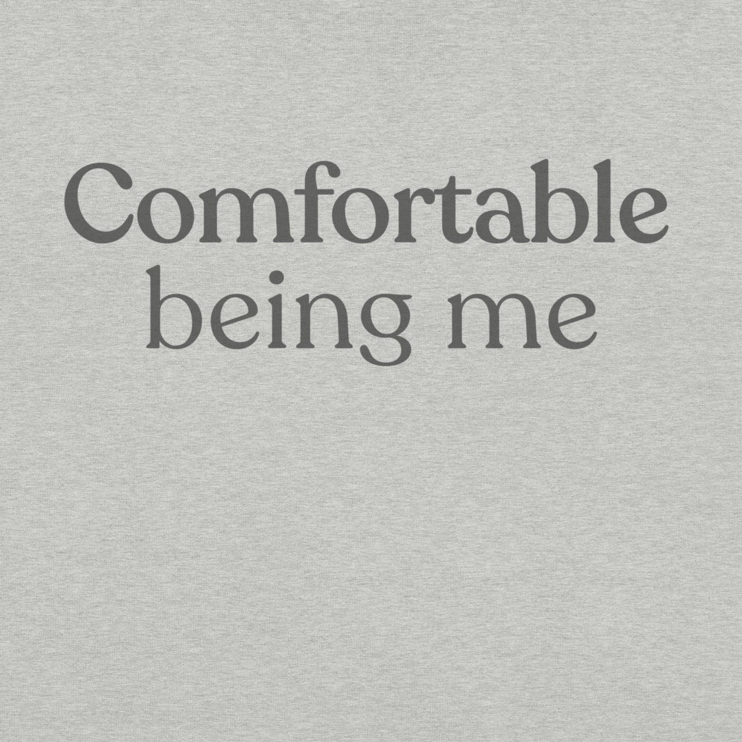 Close-up of Comfortable Being Me text printed on athletic heather T-shirt