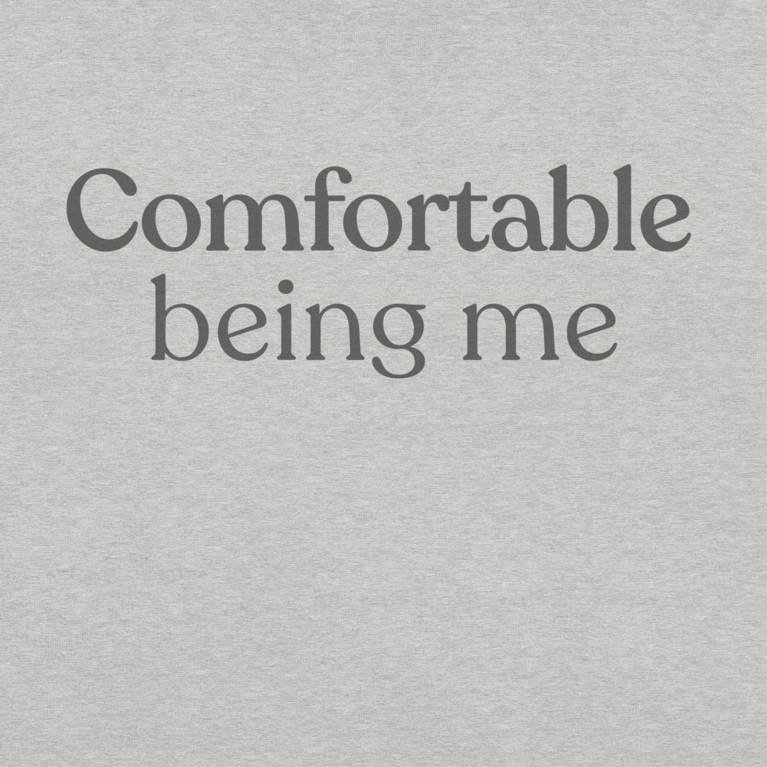 Close-up of Comfortable Being Me text printed on athletic heather T-shirt